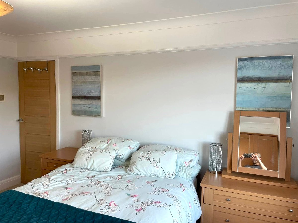 bedroom grey painted walls double bed artwork newport orchid decor