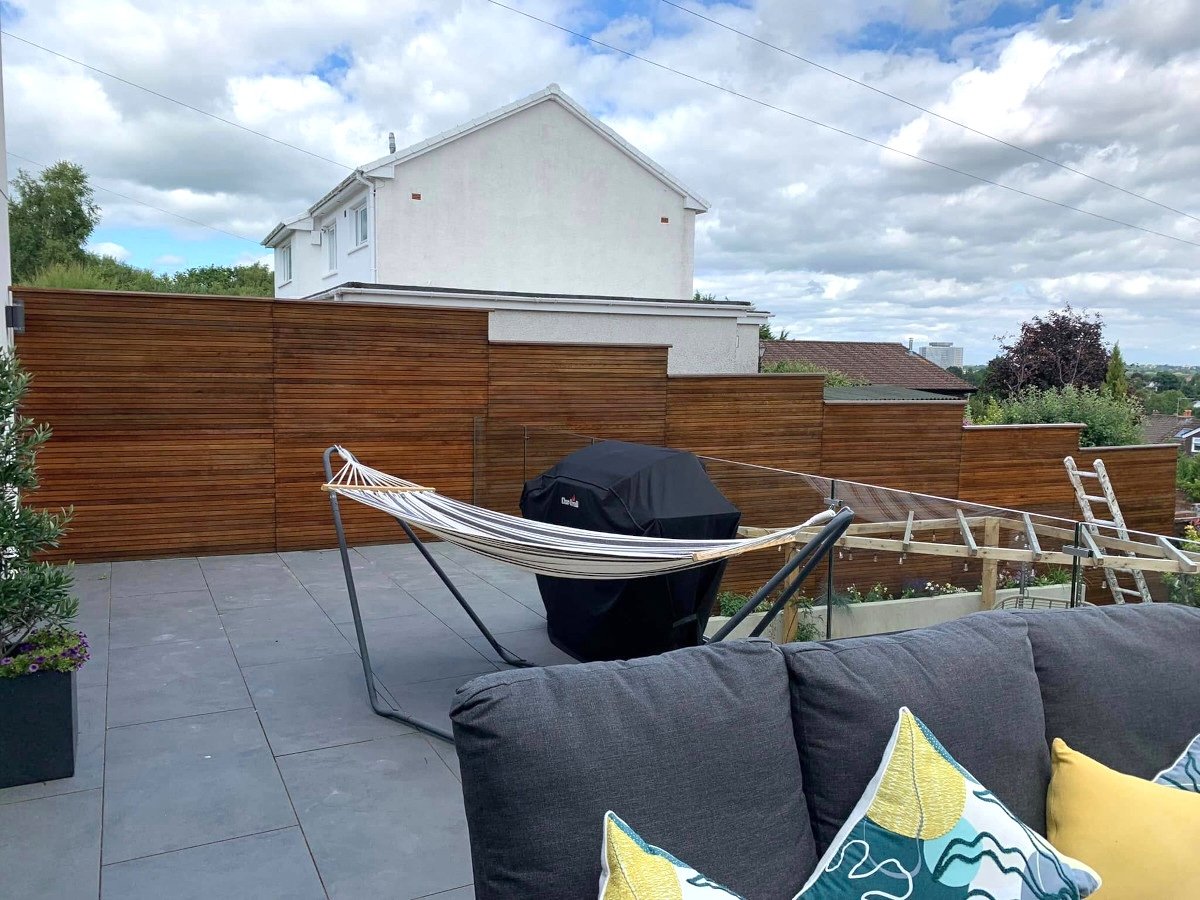 garden-fence-painted-after-newport-orchid-decor Newport garden deck expertly stained by Orchid Decor, deck painters in Newport.