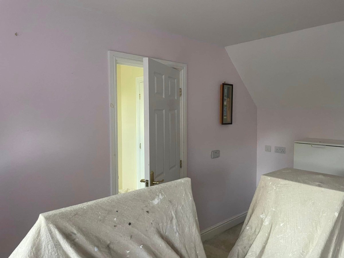 decorating-nelson-orchid-decor loft bedroom pink painted walls door ajar newport orchid decor