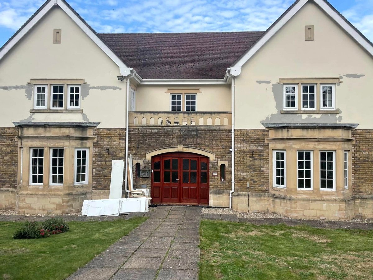 newport house exterior painted before orchid decor