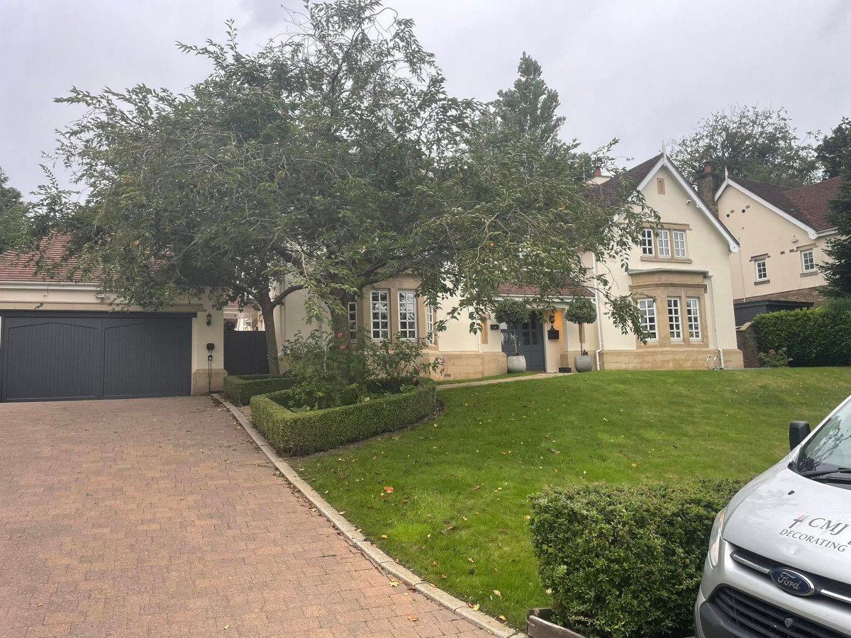 newport house exterior walls garage door paitned orchid decor