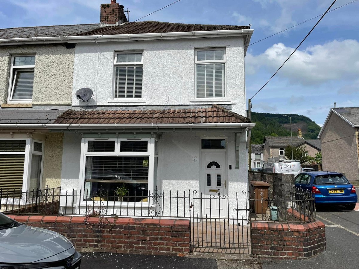 newport terraced house exterior front painted orchid decor