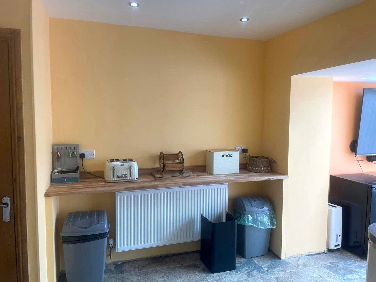 utility room cream painted walls breakfast bar newport orchid decor